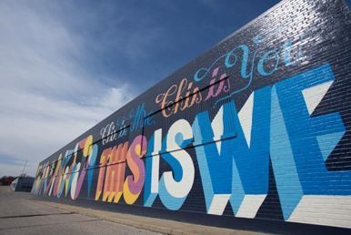 Mural created on Broad Avenue during its revitalization, courtesy Andrew Breig