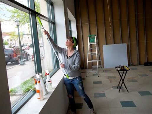 Joan Vorderbruggen readying a storefront