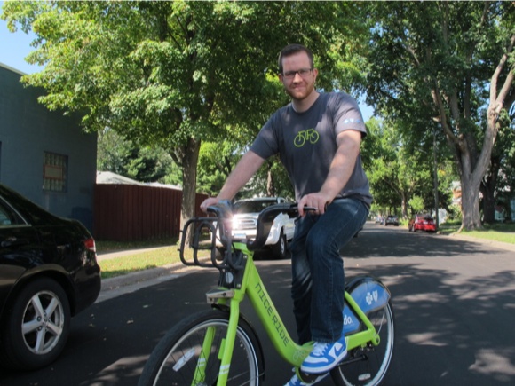 Anthony Ongaro aboard a familiar green bicycle