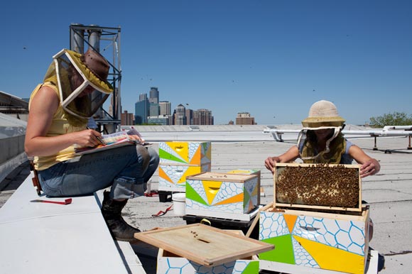Judy Gerdts and Becky Masterman of the Bee Squad atop the Minneapolis Institute of Arts